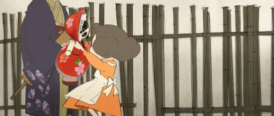 The little girl spinning and dancing around with the Bunka Doll, until she trips and drops her into the mud.