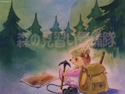 Artwork with the woods as a backdrop, Juliette sits in the corner holding a pickaxe, wearing a duffle bag and feathered hat, and with binoculars and a map beside her.